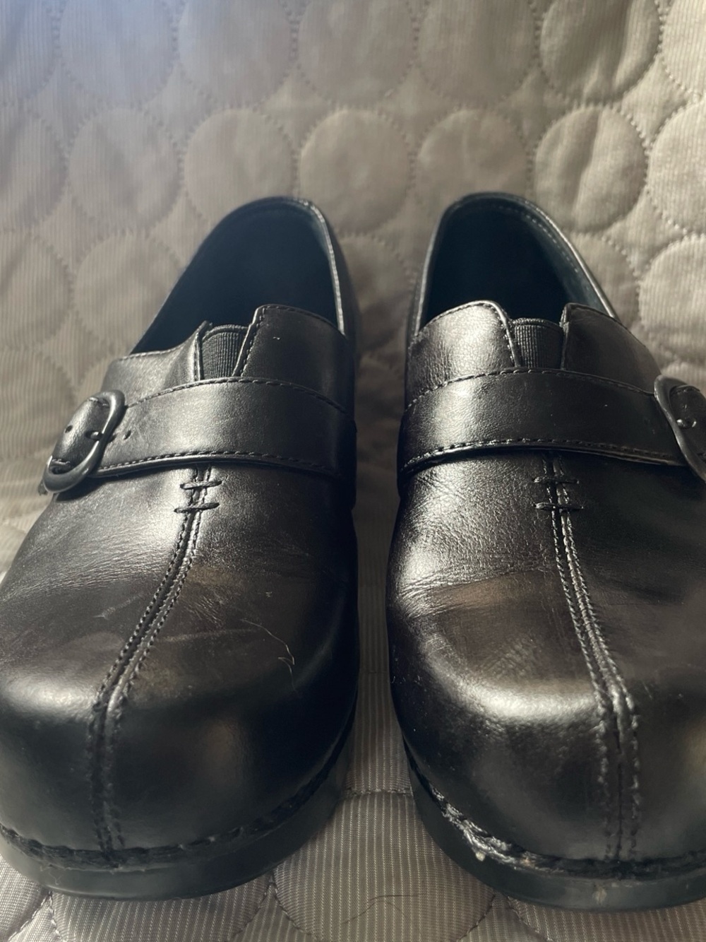 Dansko Black Leather Slip-On Loafers with Buckle Detail